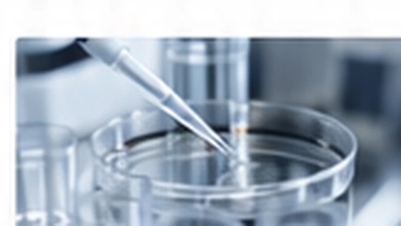 Precision pipette dispensing liquid into a laboratory dish